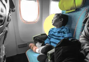The Kindness of Strangers: I Was a Ball of Stress Taking My Four Children on an International Flight – Then a Passenger Tucked a Blanket Around My Sleeping Son