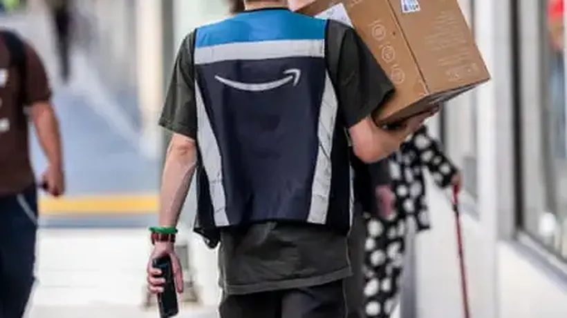 Amazon raises starting pay to $20 an hour and adds Whole Foods discount