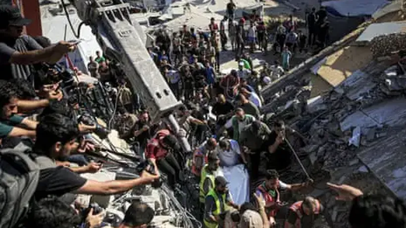 At least 12 killed after building in Gaza City damaged by Israeli strikes collapses